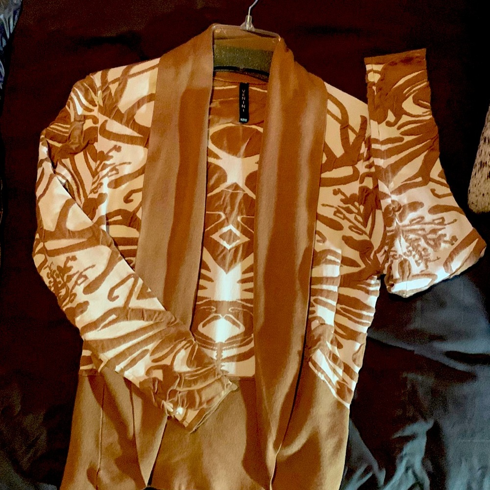 Bolero style open cardigan. Beautiful with white pants or skirt